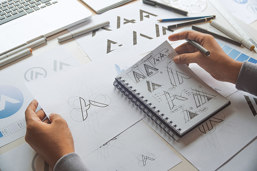 Graphic designer creative design sketch drawing logo Trademark brand Workspace